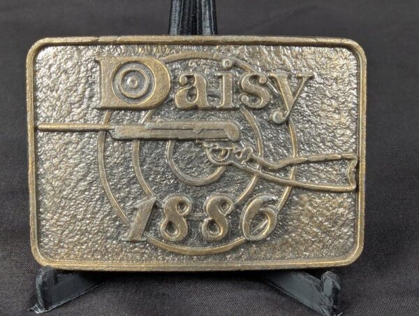 Vintage Daisy 1886 Brass Belt Buckle Manufactured by Astamar Boston Advertising