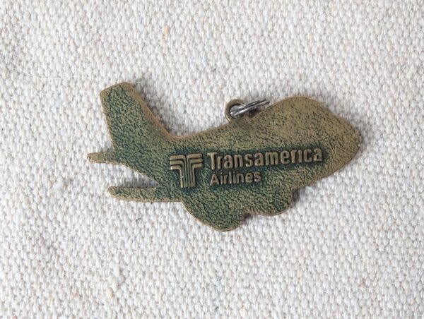Vintage Transamerica Airlines Brass Airplane Charm Keychain Aviation Memorabilia