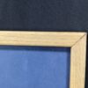 10-1189.jpg Framed Color Photograph Peruvian Girl Blue Plaid Dress 14x17 Oak Style Frame