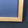 10-1191.jpg Framed Color Photograph Peruvian Girl Blue Plaid Dress 14x17 Oak Style Frame