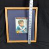 10-1195.jpg Framed Color Photograph Peruvian Girl Blue Plaid Dress 14x17 Oak Style Frame