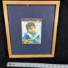 10-1196.jpg Framed Color Photograph Peruvian Girl Blue Plaid Dress 14x17 Oak Style Frame