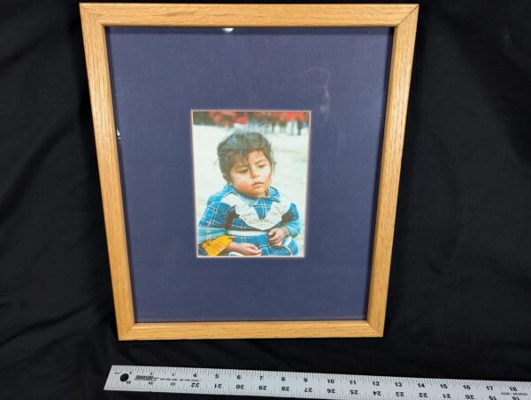 10-1196.jpg Framed Color Photograph Peruvian Girl Blue Plaid Dress 14x17 Oak Style Frame