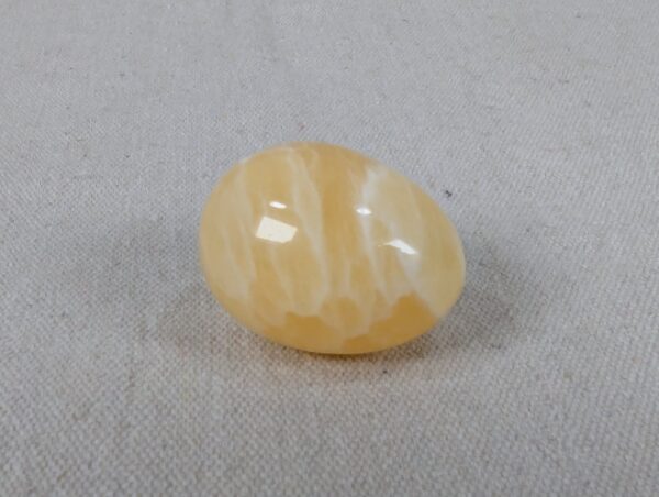Polished Yellow Calcite Decorative Egg Natural Stone Banded Pattern 2 Inch Tall