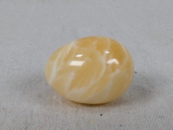 Polished Yellow Calcite Decorative Egg Natural Stone Banded Pattern 2 Inch Tall