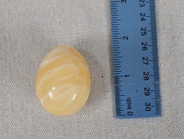 Polished Yellow Calcite Decorative Egg Natural Stone Banded Pattern 2 Inch Tall