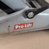 10-2730.jpg Pro-Lift F-2330 2-Ton Hydraulic Floor Jack 4000lb Capacity 2003 Silver Red Black
