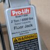 10-2735.jpg Pro-Lift F-2330 2-Ton Hydraulic Floor Jack 4000lb Capacity 2003 Silver Red Black