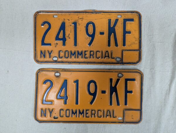 Vintage New York Commercial License Plate Pair 1970s Orange and Blue Metal Decor