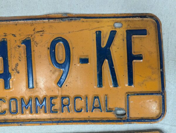 Vintage New York Commercial License Plate Pair 1970s Orange and Blue Metal Decor