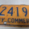 Vintage New York Commercial License Plate Pair 1970s Orange and Blue Metal Decor