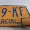 Vintage New York Commercial License Plate Pair 1970s Orange and Blue Metal Decor