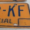 Vintage New York Commercial License Plate Pair 1970s Orange and Blue Metal Decor