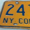 Vintage New York Commercial License Plate Pair 1970s Orange and Blue Metal Decor