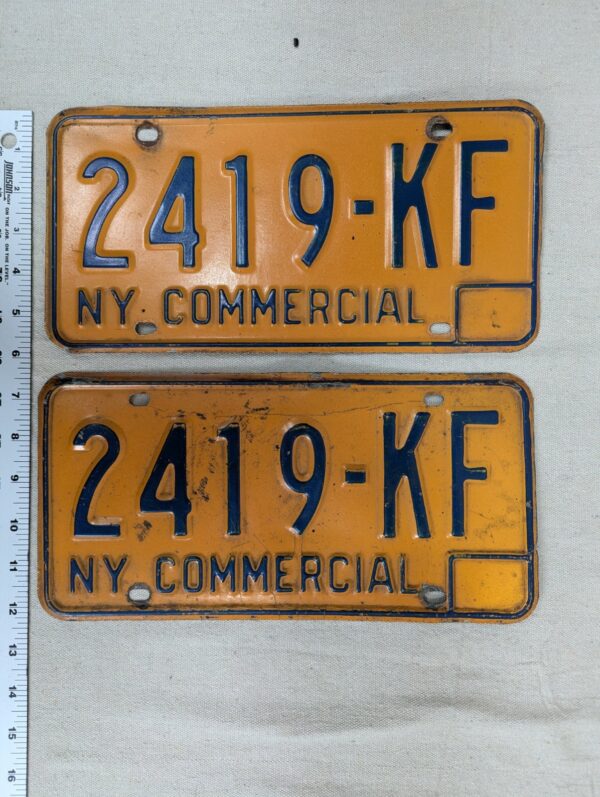 Vintage New York Commercial License Plate Pair 1970s Orange and Blue Metal Decor