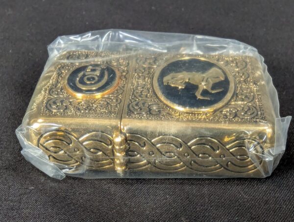 The Franklin Mint Spirit of the Old West Gold-Tone Lighter and Display Stand Set