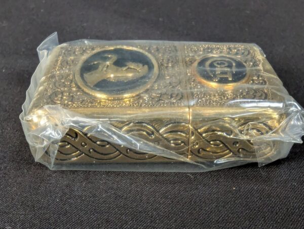 The Franklin Mint Spirit of the Old West Gold-Tone Lighter and Display Stand Set