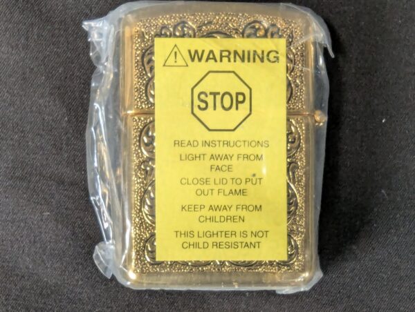 The Franklin Mint Spirit of the Old West Gold-Tone Lighter and Display Stand Set