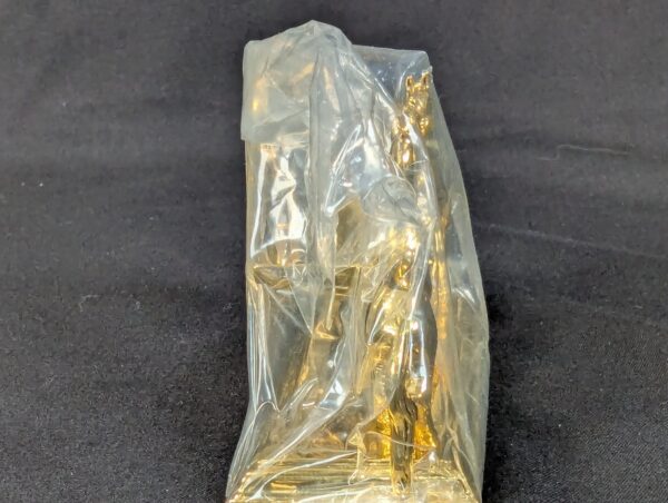 The Franklin Mint Spirit of the Old West Gold-Tone Lighter and Display Stand Set