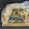 The Franklin Mint Spirit of the Old West Gold-Tone Lighter and Display Stand Set