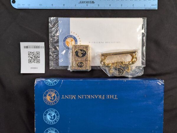 The Franklin Mint Spirit of the Old West Gold-Tone Lighter and Display Stand Set