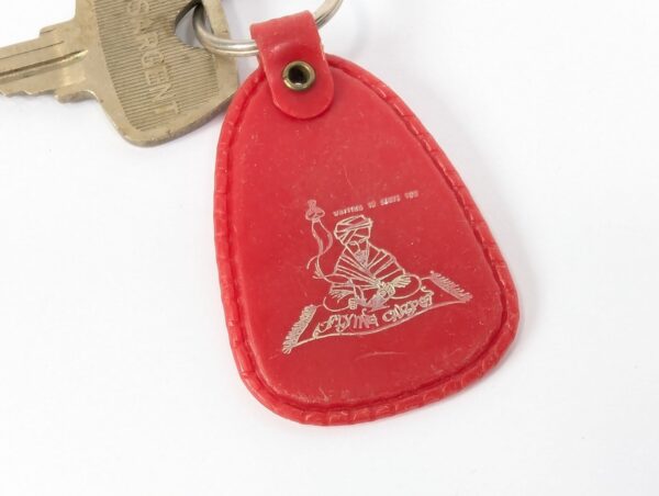 Flying Carpet Motel Room Key with Plastic Keychain White Text Metal Key Tag