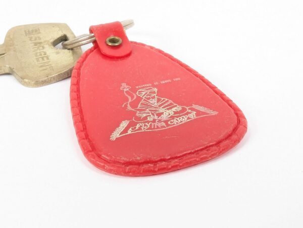 Flying Carpet Motel Room Key with Plastic Keychain White Text Metal Key Tag