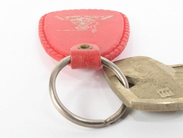Flying Carpet Motel Room Key with Plastic Keychain White Text Metal Key Tag