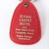 Flying Carpet Motel Room Key with Plastic Keychain White Text Metal Key Tag