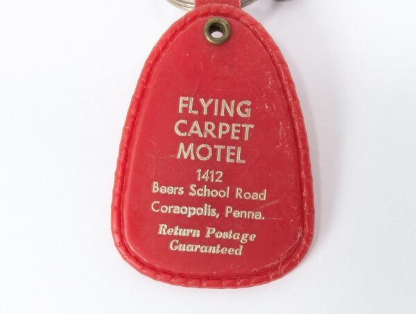 Flying Carpet Motel Room Key with Plastic Keychain White Text Metal Key Tag