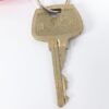 Flying Carpet Motel Room Key with Plastic Keychain White Text Metal Key Tag
