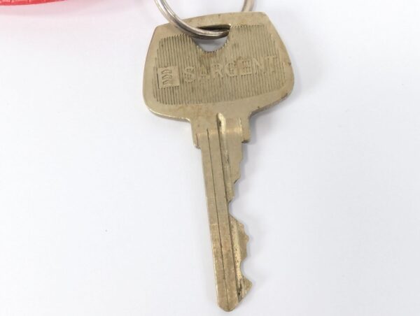 Flying Carpet Motel Room Key with Plastic Keychain White Text Metal Key Tag