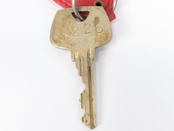 Flying Carpet Motel Room Key with Plastic Keychain White Text Metal Key Tag