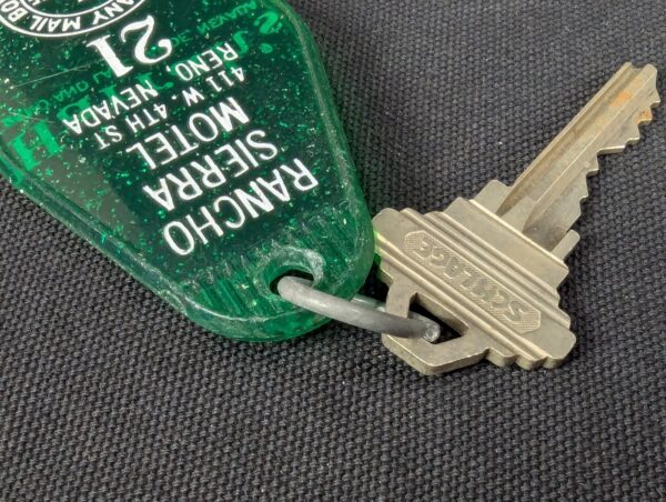 Vintage Rancho Sierra Motel Key and Green Plastic Keychain Tag Schlage Reno NV