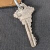 Vintage McGuire Holiday Motel Key and Keychain Wrightstown NJ Mid-Century Brown