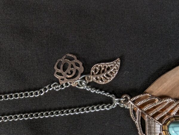10-580.jpg Boho Long Necklace Metal Filigree Feather Pendant Faux Turquoise Brown Accent...