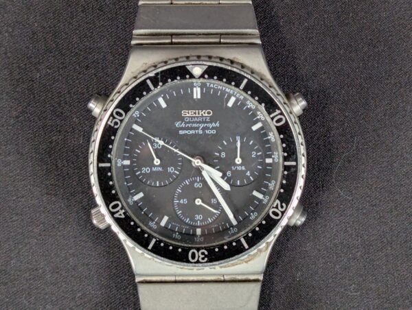 10-881.jpg Vintage 1983 Seiko Sports 100 Chronograph 7A28-7040 Stainless Steel Quartz Watch